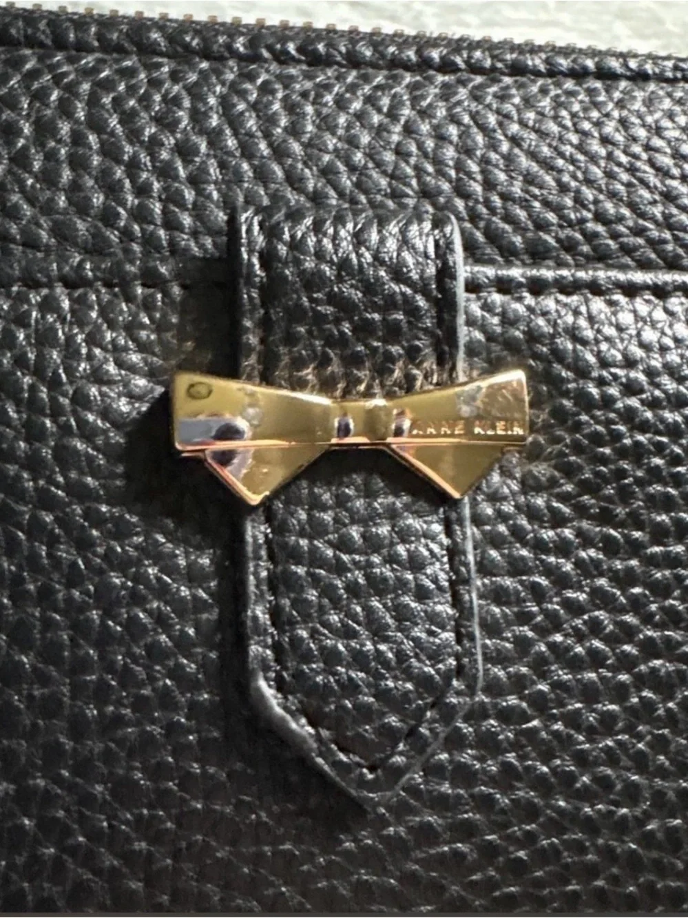 Anne Klein Black leather wallet with gold bow detail